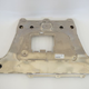 OEM aluminum subframe reinforcement plate - note the un-crushed condition of the oval-like bump at top-center. I’m an idiot.